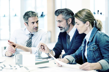 Team of architects working on construction project