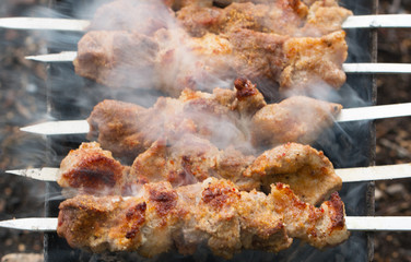 fried skewers on the grill
