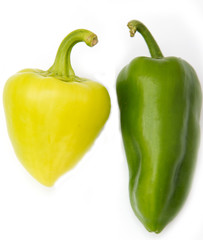 yellow and green bell peppers on a white background