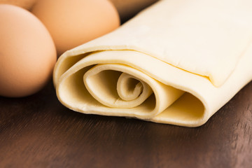 homemade dough on a wooden board