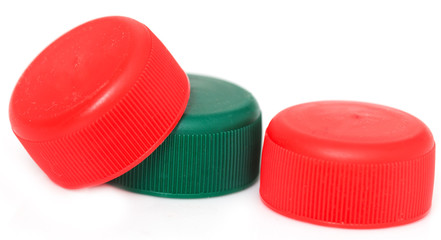 three bottle cap with green and red