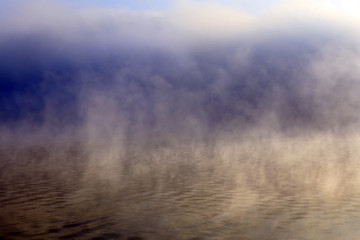 Fototapeta premium dense fog over the river