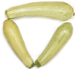 fresh young zucchini on a white background