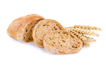 Tasty bread with wheat on a white background.