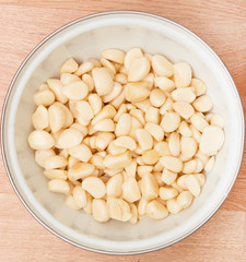 peeled garlic in a cup