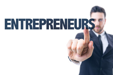Business man pointing the text: Entrepreneurs