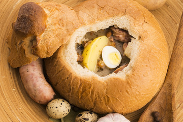 traditional white borscht (zurek) with sausage,egg and mushrooms