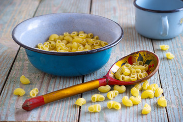 dry pasta on the wooden table