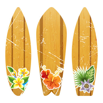 wooden surfboards with floral prints