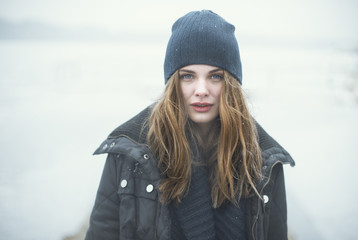 portrait of a beautiful young girl in a cap