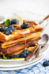 Lemon blueberry waffles with honey
