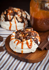 Caramel and chocolate Pavlova meringue cake