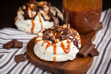 Caramel and chocolate Pavlova meringue cake