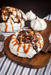 Caramel and chocolate Pavlova meringue cake