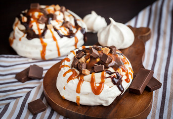 Caramel and chocolate Pavlova meringue cake