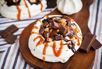 Caramel and chocolate Pavlova meringue cake