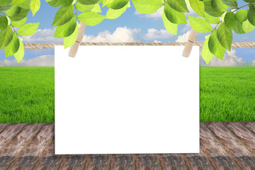 Empty blank paper against blue sky