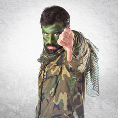 Soldier doing bad signal