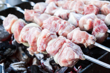 Cooking shish kebab on skewers