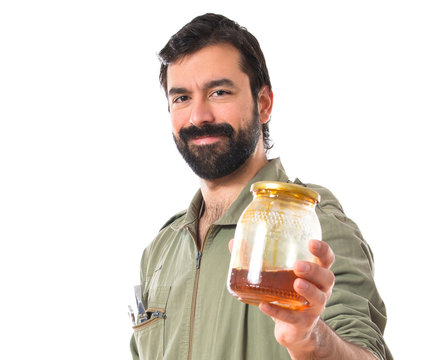 Mechanic Holding A Varnish