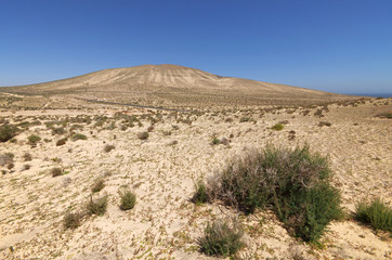Sand dunes and mountains near Sotavento beach on Jandia peninsul