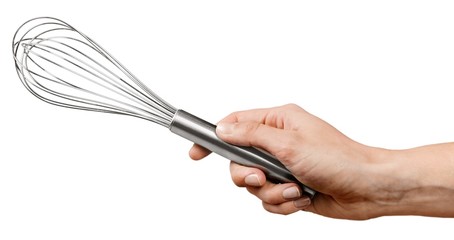 Kitchen. Frame with many hands holding different kitchen tools