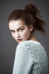 fashion model pose in blue jeans and woolly sweater © Rattleray