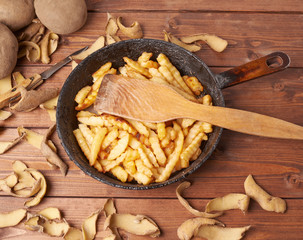 Cooking fried french potatoes composition