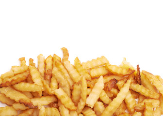 Pile of multiple wavy french fries isolated