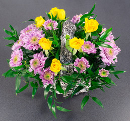 Basket of flowers and greens