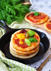 Pepperoni pizza and egg for breakfast