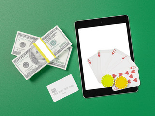 Cards and chips for poker on tablet.
