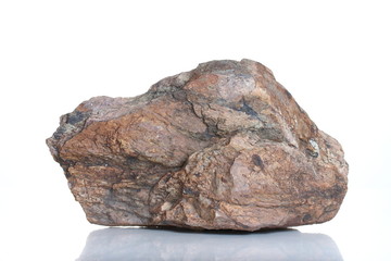 Fragment of granite , isolated on white background