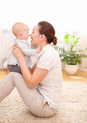 Mother holds child