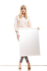 woman holding blank presentation board