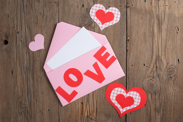 Love letter on old wooden background