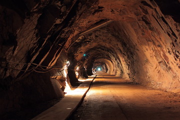 Dark tunnel in old uranium mine in Poland