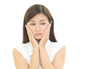 Fototapeta premium 困惑した表情の女性