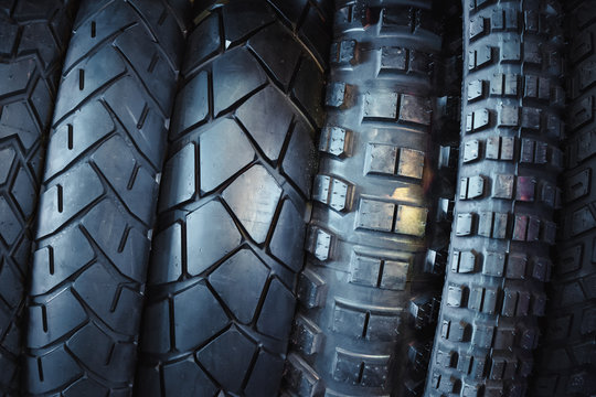 Fototapeta Motorcycle tires, stylized toning image.