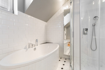Bathtub in white bathroom