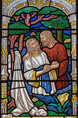 Fototapeta na wymiar Jerusalem - baptism of Christ scene on the windowpane