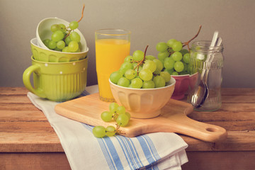 Fresh grapes on wooden table