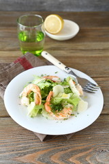 Salad with shrimps, lettuce and parmesan