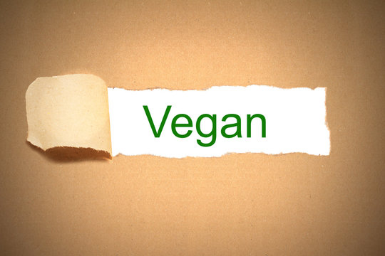 brown paper torn to reveal vegan