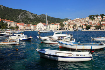 Fototapeta na wymiar Fishing boats in harbor of the city of Hvar