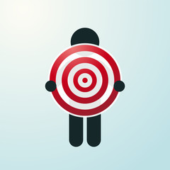 figure holding a red target