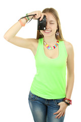 young girl with camera in hand taking pictures