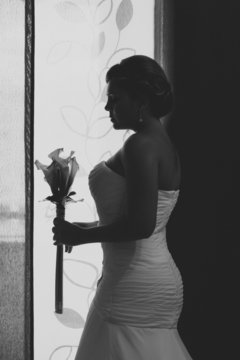 Bride Besides a Window
