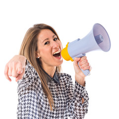 Woman shouting by megaphone