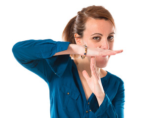 Woman making time out gesture